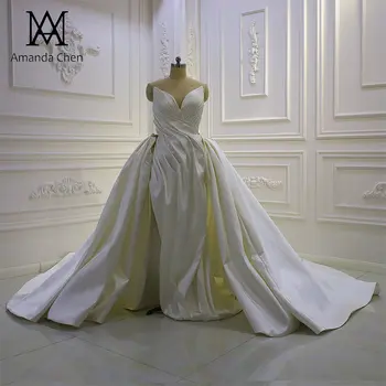 Свадебного платья со съемной юбкой из атласа в складку с открытыми плечами